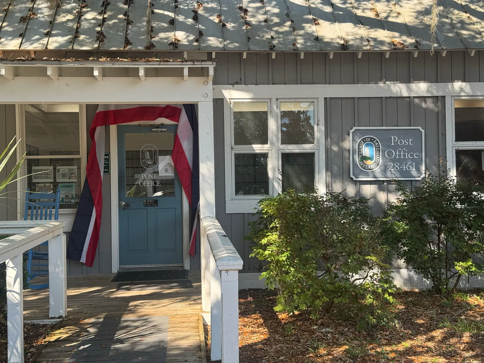 Bald Head Island Post Office storefront with village seal sign