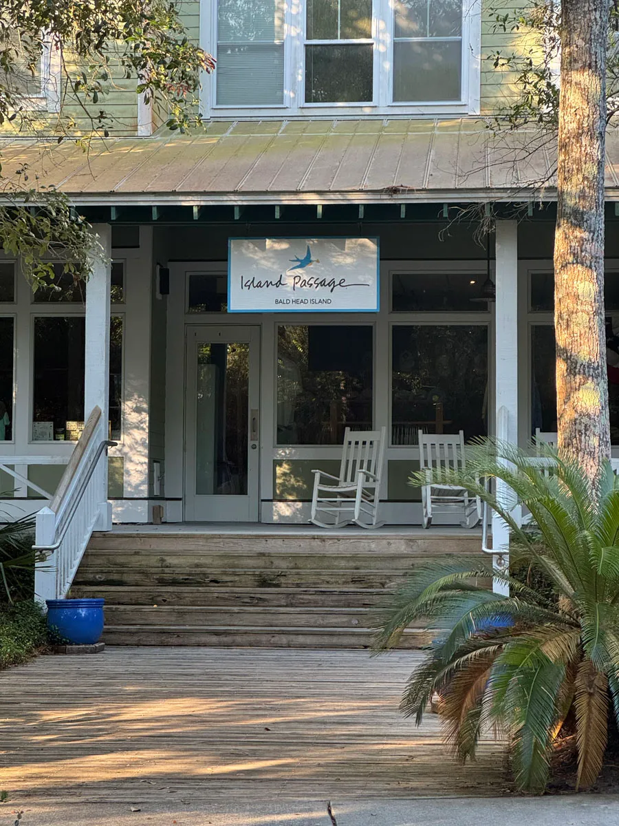 Island Passage boutique storefront with rocking chairs