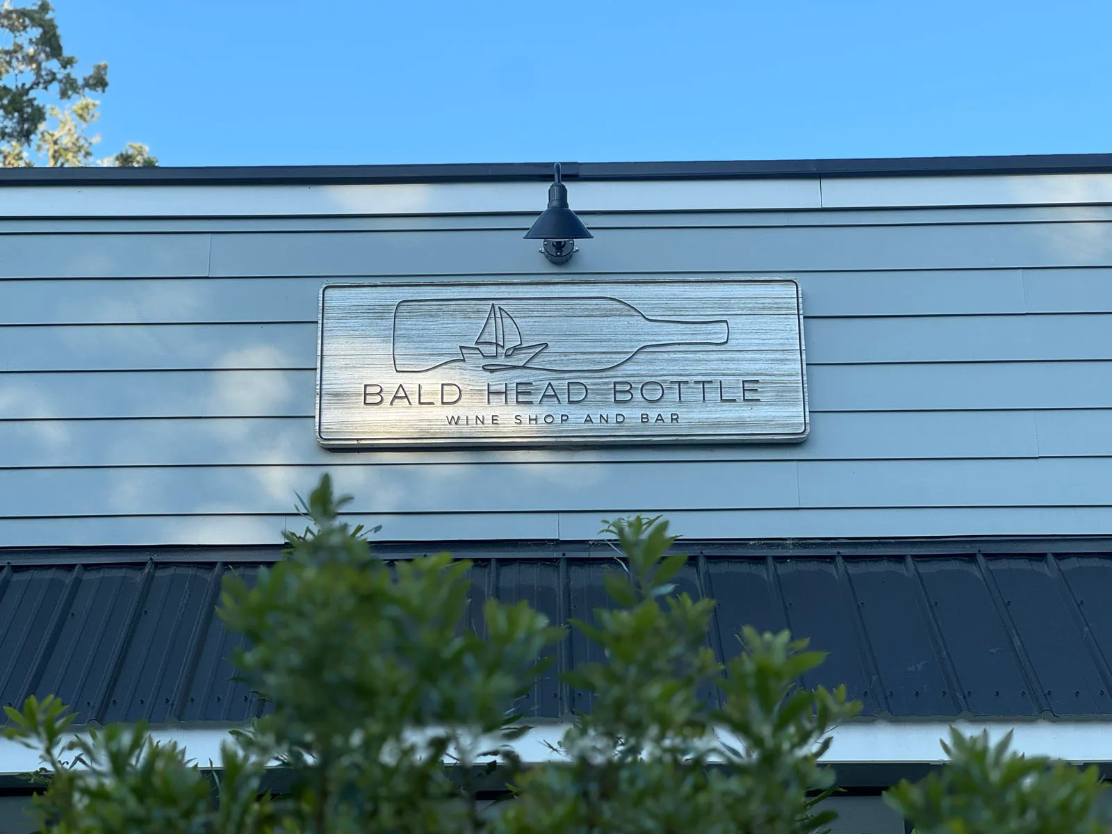 Bald Head Bottle wine shop and bar exterior sign