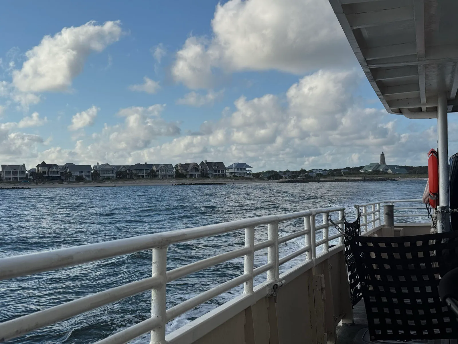 Old Baldy lighthouse and shoreline homes from ferry